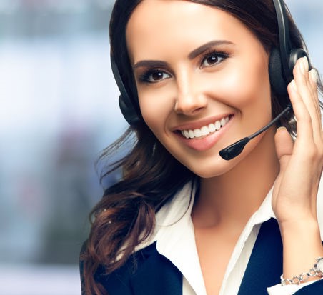 Call Center Service. Photo of customer support or sales agent. Female caller or receptionist phone operator. Copy space for some text, advertising or slogan. Help line answering and telemarketing.